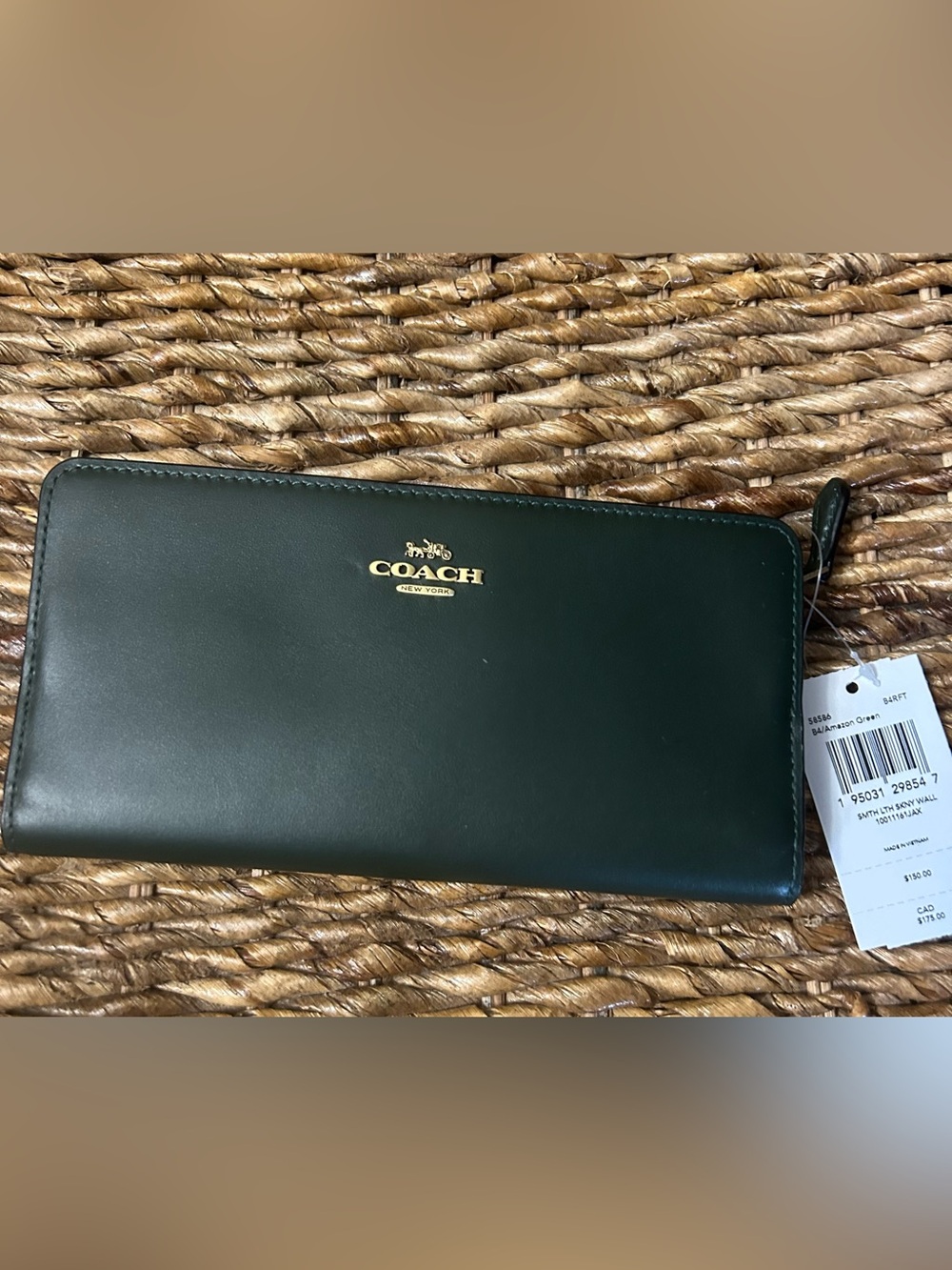 COACH Leather Wallet in Amazon Green. There’s a small dent on the back